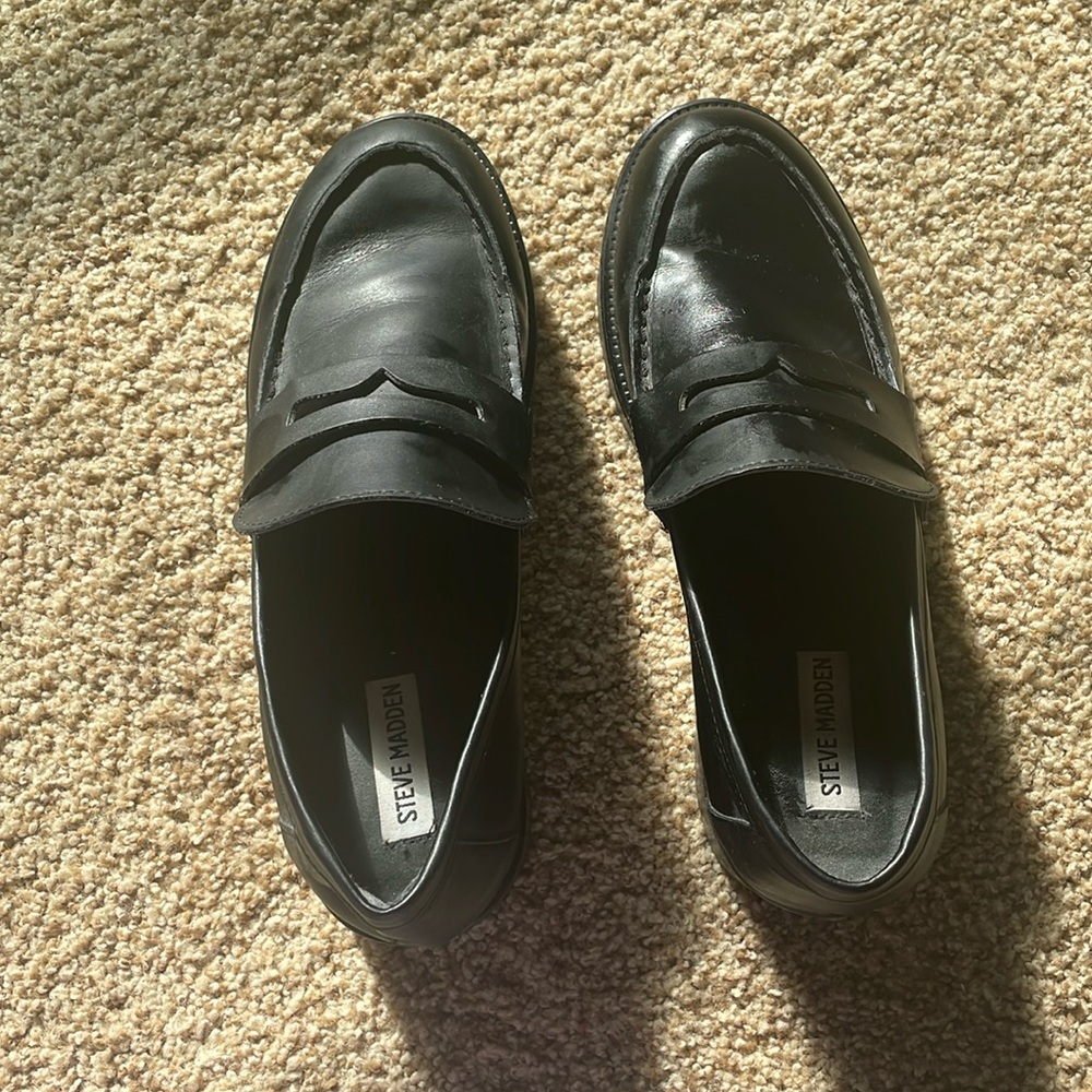 Brand new Steve Madden black loafers. Worn once.